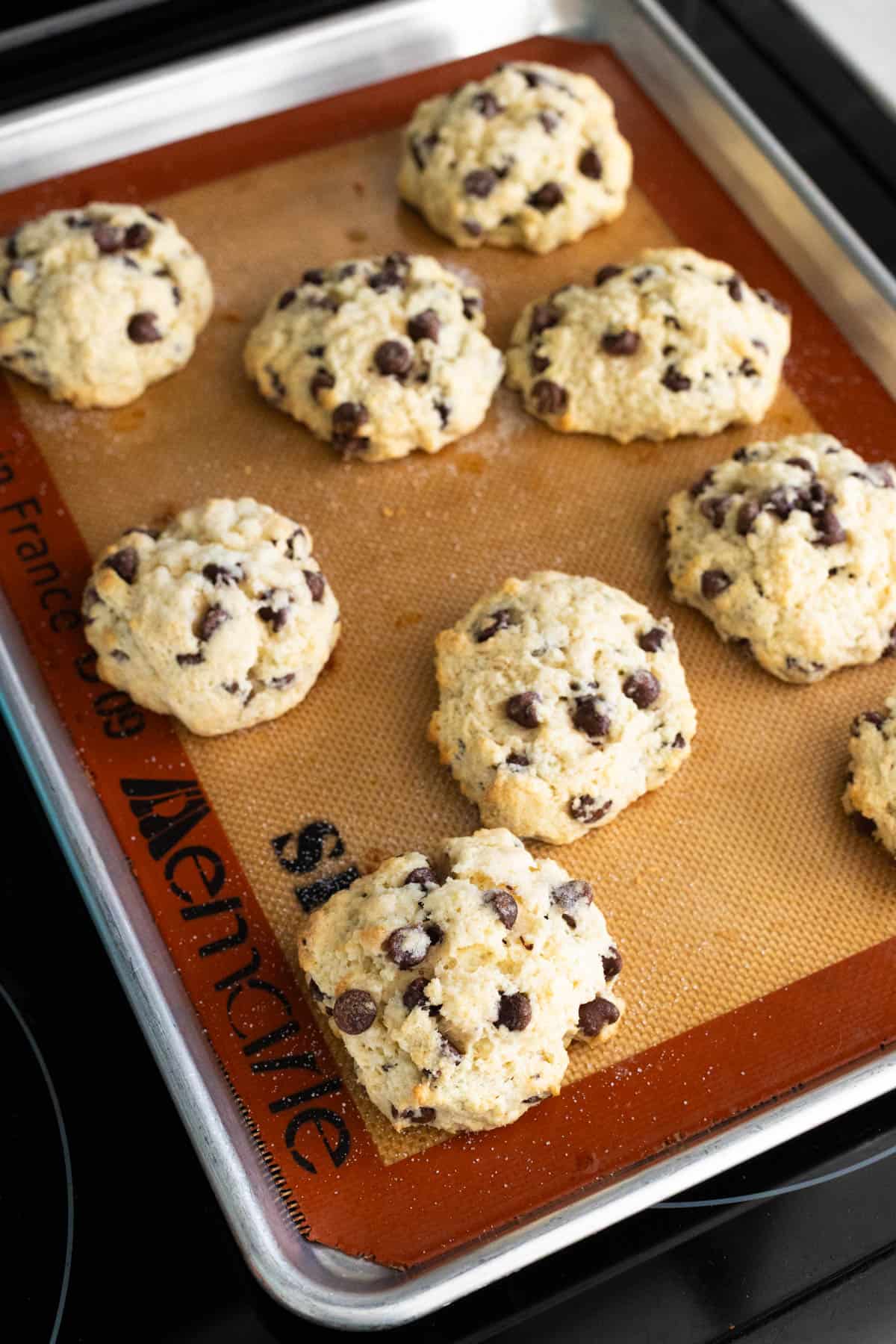 The baking pan is fresh from the oven and the scones are golden brown.