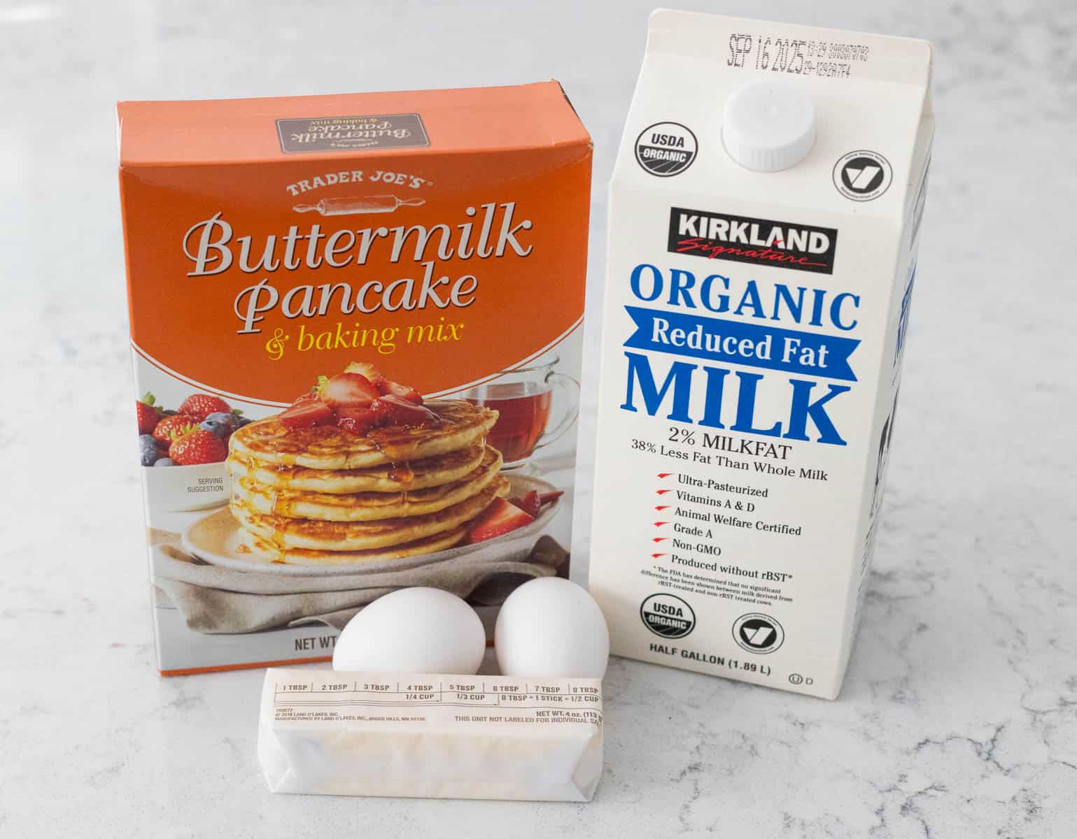 The ingredients to make Sheet Pan Pancakes are on the kitchen counter.