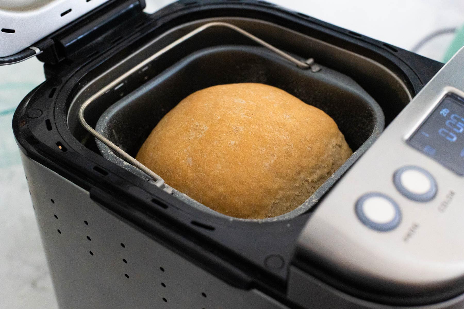 Baked French Pear Bread inside the bread machine pan