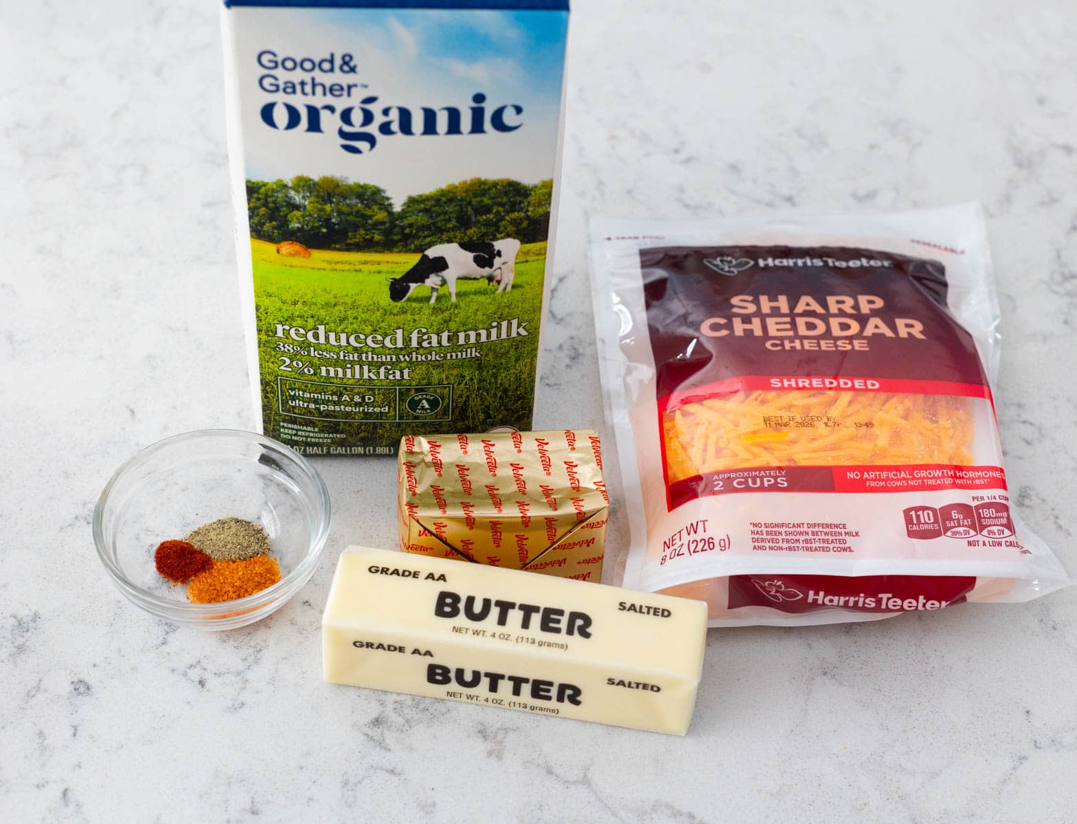 The ingredients to make homemade mac and cheese are on the counter.