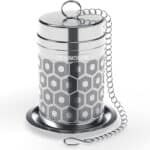 A small silver tea strainer.