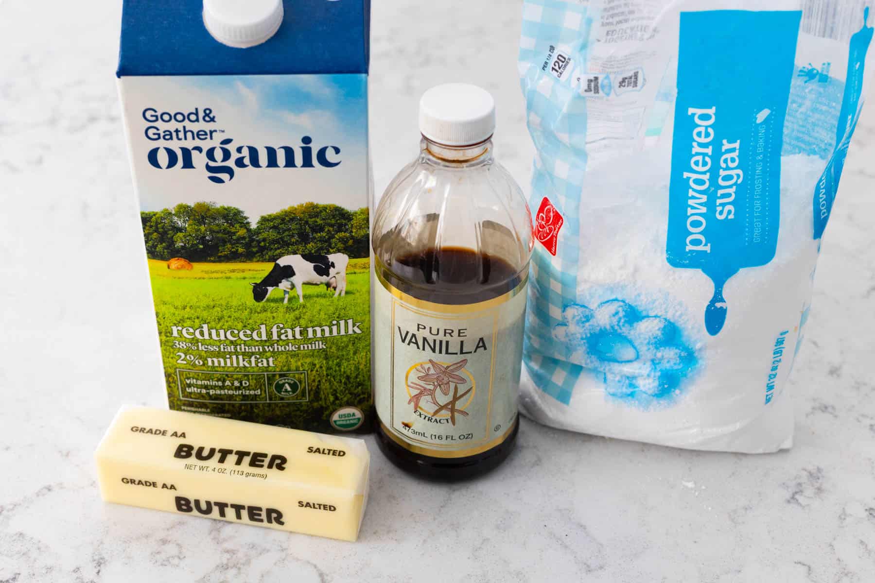 The ingredients to make the frosting are on the counter.