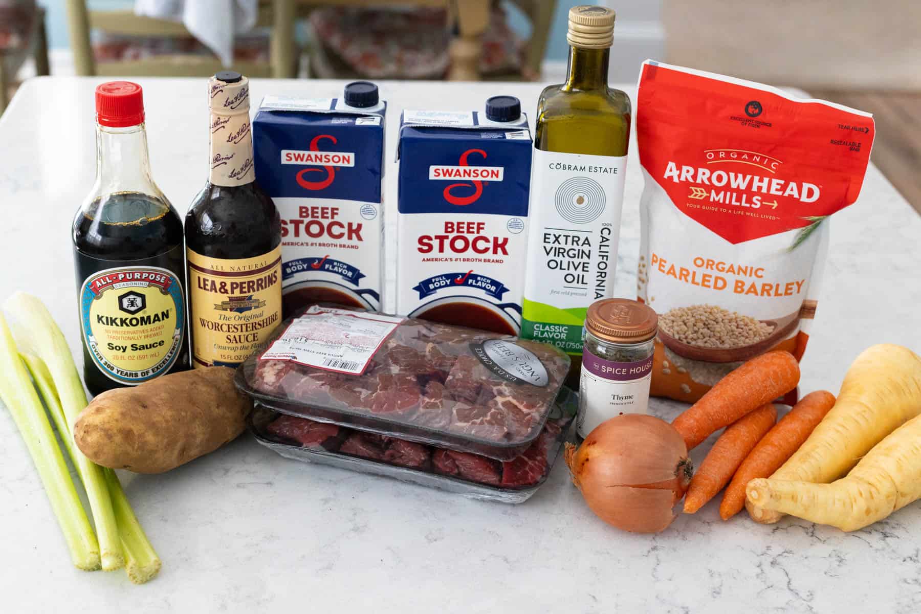 The ingredients to make Beef and Barley Soup are on the kitchen counter.