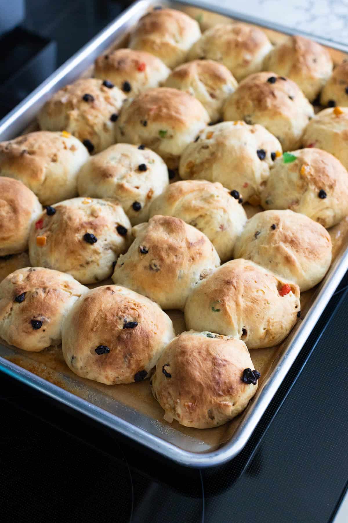 The pan of baked stollen buns is fresh from the oven.