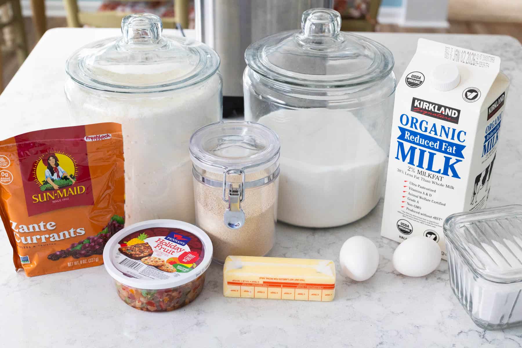 The ingredients to make Stollen Buns are on the kitchen counter.