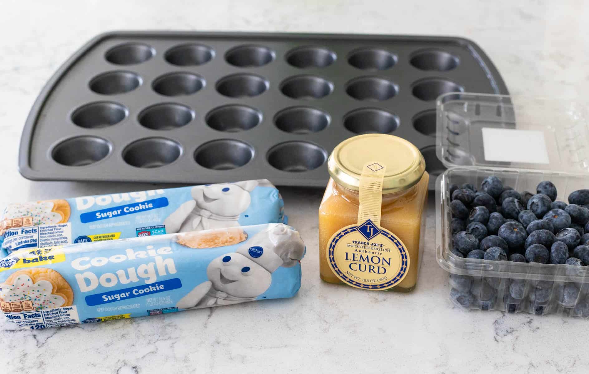 The ingredients to make Sugar Cookie Cups are on the kitchen counter.