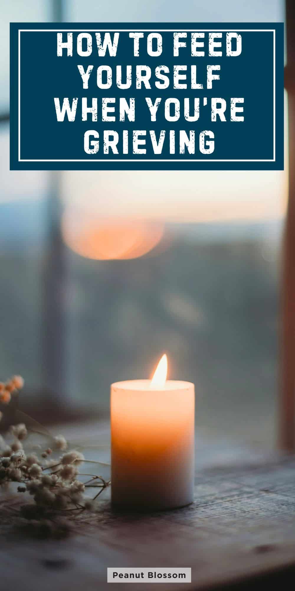 A single candle glows in the window.