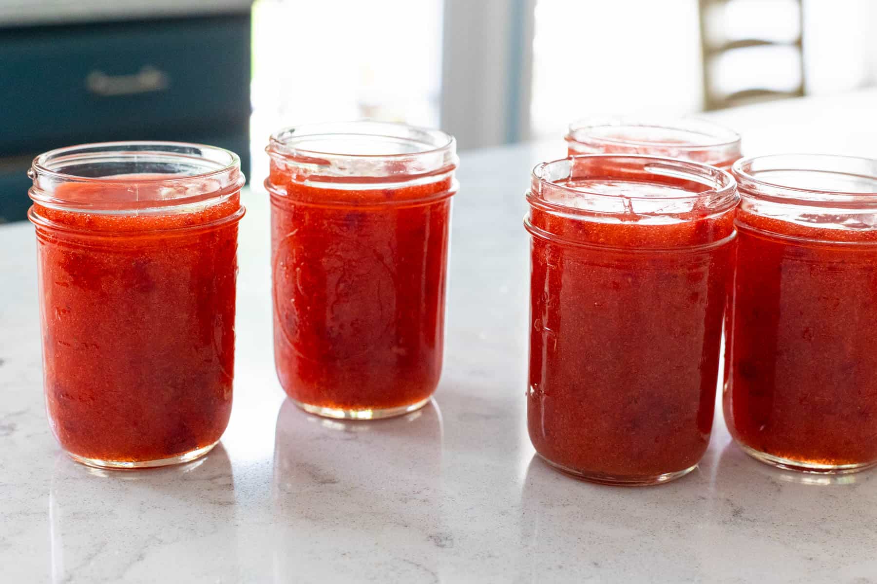 The jars are cooling on the kitchen counter.